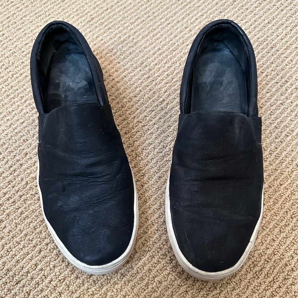 VINCE distressed black Leather Slip-On Sneaker.